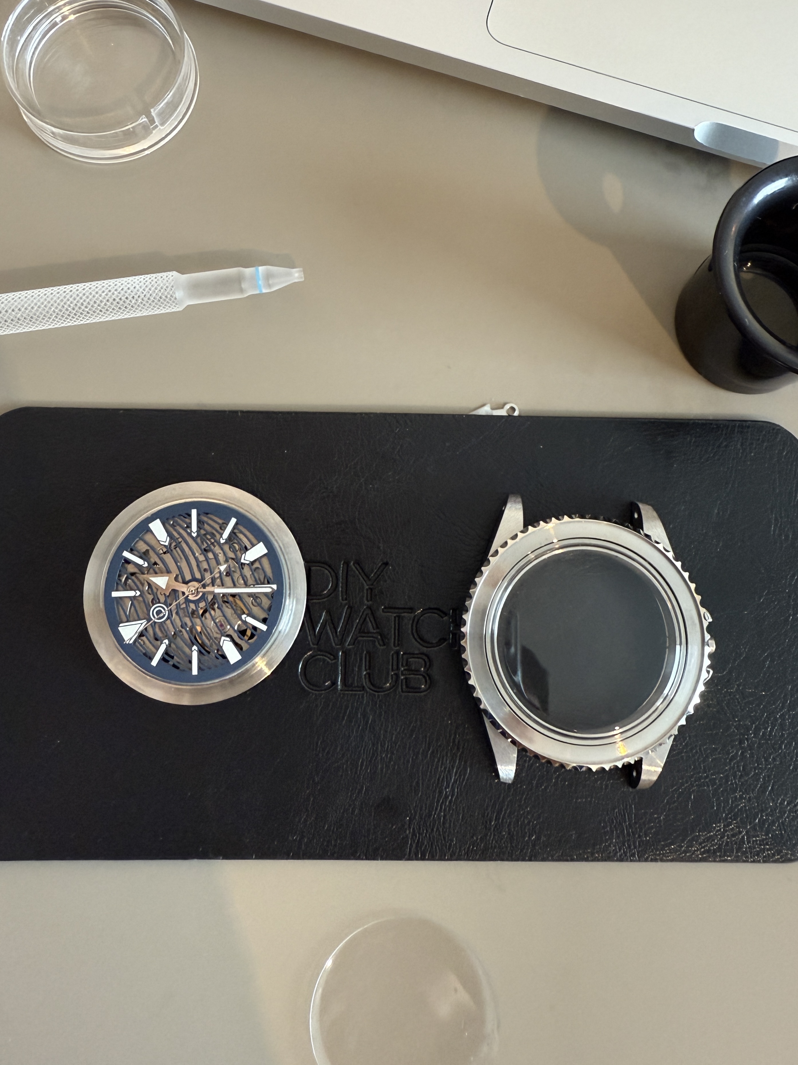 Watch Dial and Case on Assembly Mat